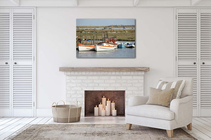 Boats on the creek at Morston Quay with North Norfolk salt marsh in the background